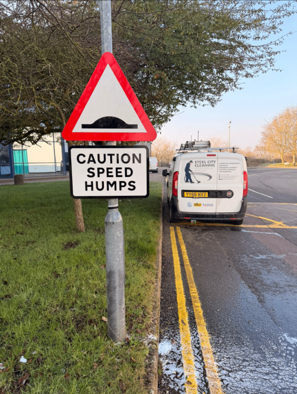 After cleaning, roadside caution sign with a cleaner face and brighter finish